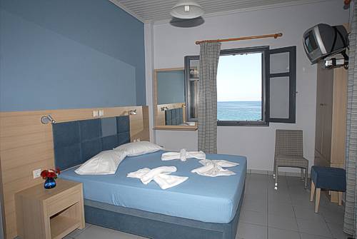 IRENE Rooms & Studios that have been fully renovated in 2011 (Eco colours have been used all over the accommodation for its painting) are divided only by the beach road from the crystal clear waters of Petra Bay.